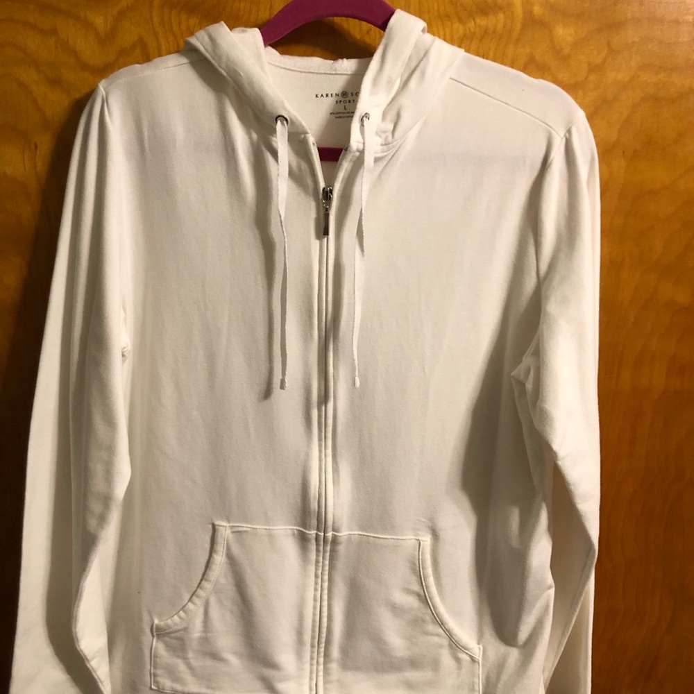 White zip front hooded sweatshirt.